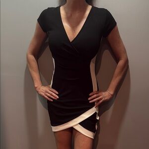 Almost Famous Black and White Asymmetrical Wrap Mini Dress